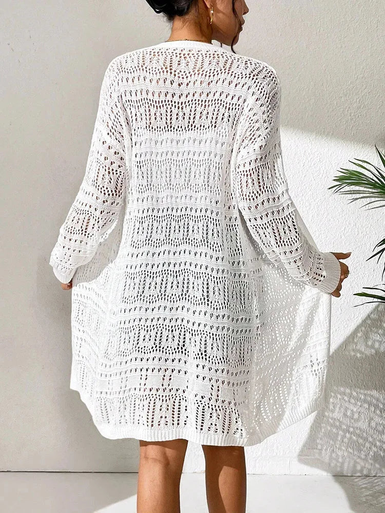 Polyester 100% solid color knitted cardigan with sun shading and loose fitting fashion, mid length and elegant sweater